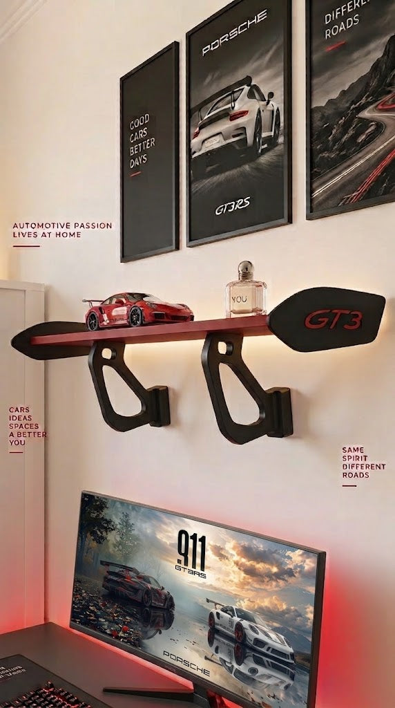 GT3 spoiler shelf on the wall above a gaming desk